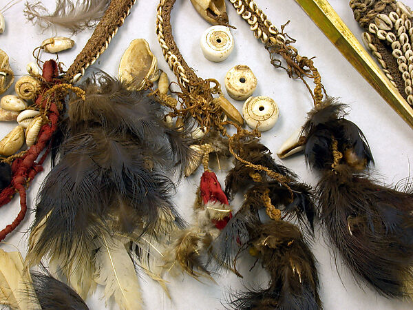 Dagger, Cassowary bone, feathers, shells, tradecloth, feathers, fiber, plastic beads, Mensuat region (?)