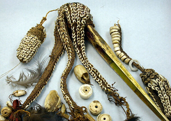 Dagger, Cassowary bone, feathers, shells, tradecloth, feathers, fiber, plastic beads, Mensuat region (?)