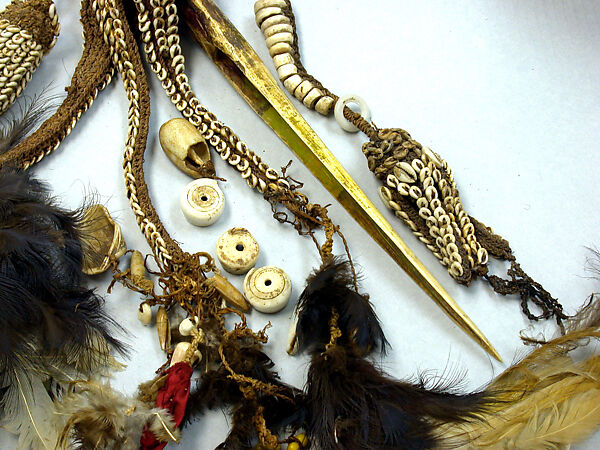 Dagger, Cassowary bone, feathers, shells, tradecloth, feathers, fiber, plastic beads, Mensuat region (?)