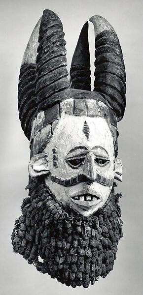Mmuo Helmet Mask, Wood, pigment, burlap, nut shells, thread, metal, Igbo peoples 