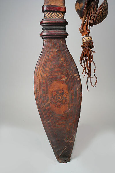 Sword and Sheath, Mande numu (blacksmith), Iron, leather, copper alloy, cloth, dye, beads, buttons, pigment, Mande peoples