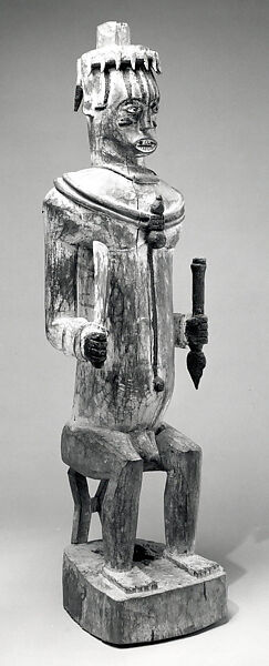 Figure: Seated Male, Wood, pigment, sacrificial materials, Edo peoples, Ishan group (?) 