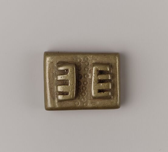 Geometric gold weight