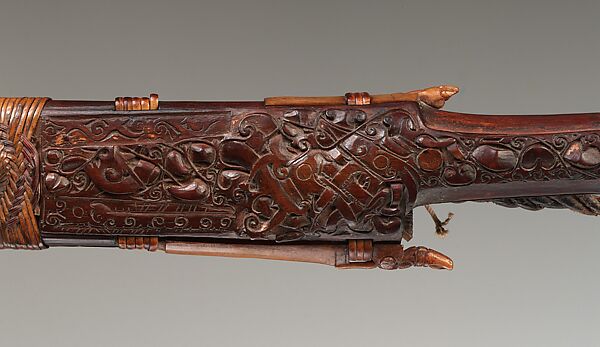 Mandau (sword) and sheath, Kenyah or Kayan artist, Steel, brass, wood, antler, bone, hair, trade cloth, fiber, Kenyah or Kayan peoples