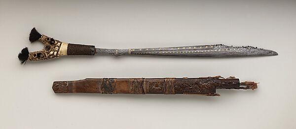 Sword (Mandau), Steel, brass, wood, antler ,bone, hair, tradecloth, fiber, Kenyah or Kayan peoples 