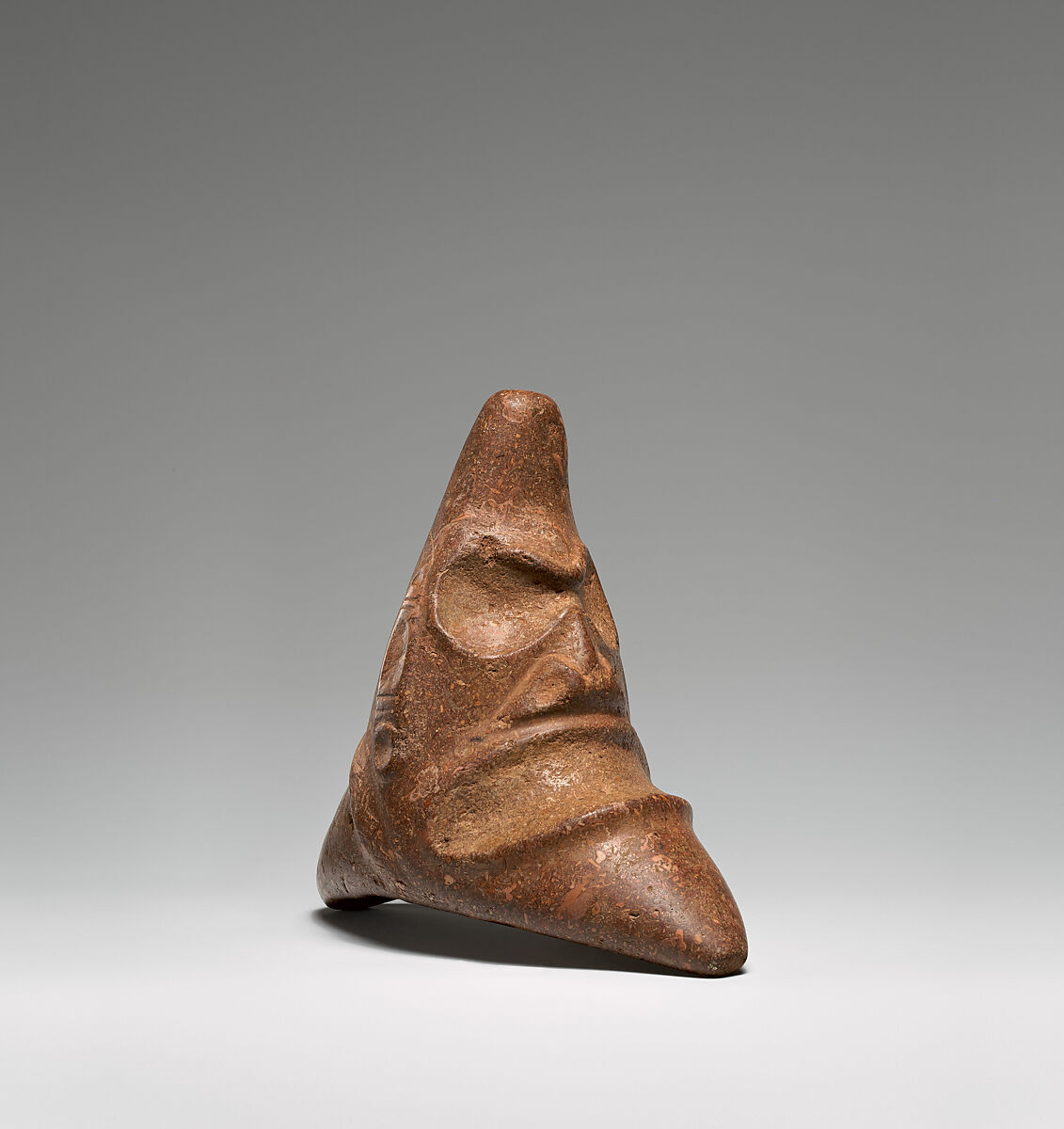 Three-cornered stone, Taíno artist(s), Limestone, Taíno