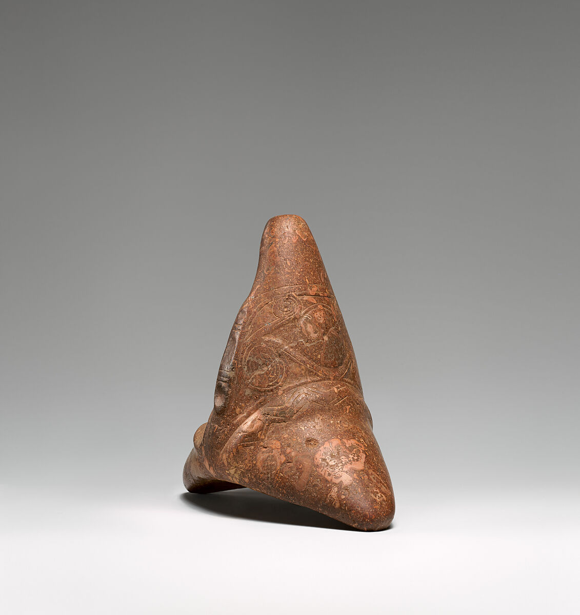 Three-cornered stone, Taíno artist(s), Limestone, Taíno