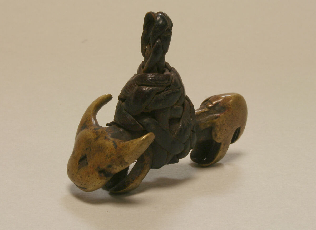 Bush Cow Pendant, Brass (cast), leather, Tussian