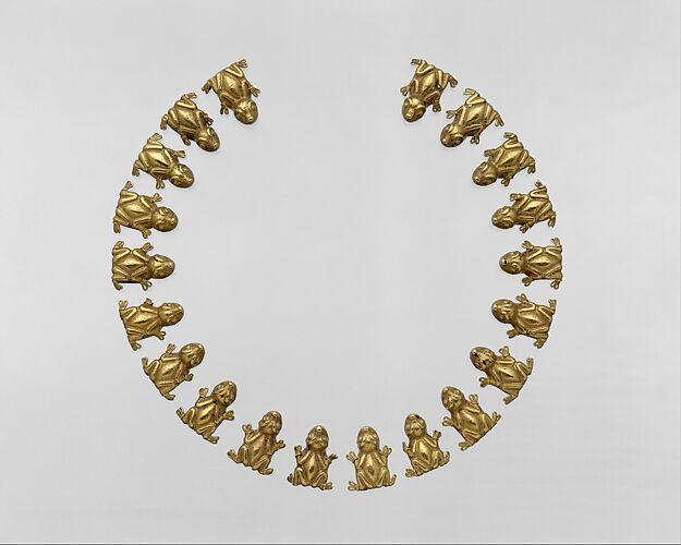 Necklace with frog-shaped beads