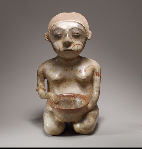 Kneeling female figure