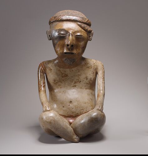 Seated male figure