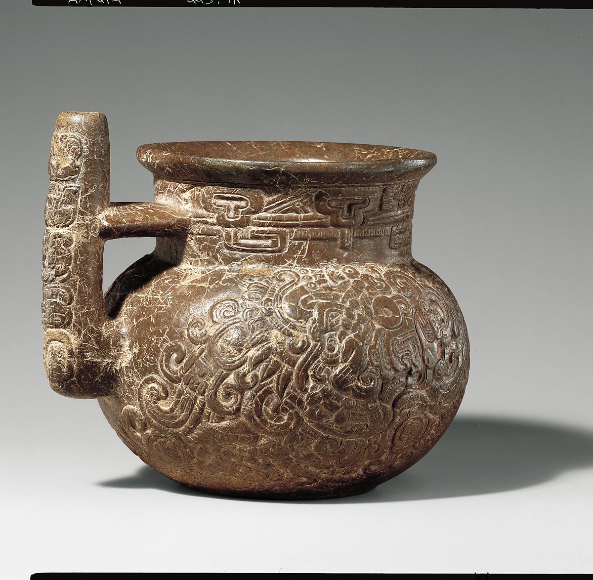 Engraved spouted jar, Maya artist(s), Indurated limestone, Maya