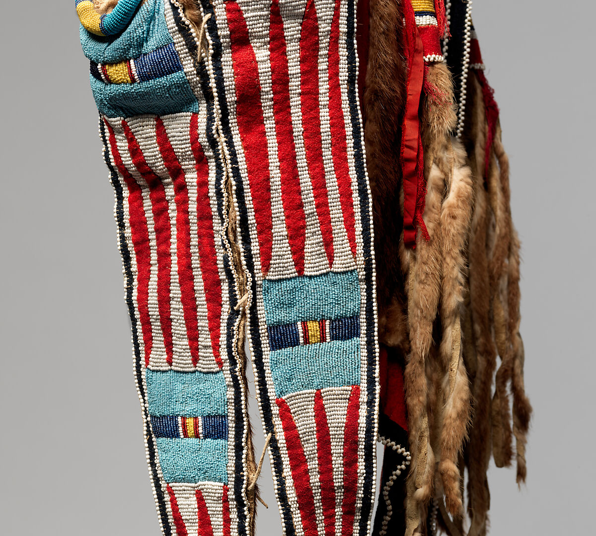 Bowcase and Quiver, Nez Perce artist, Otter skin, native-tanned leather, wool cloth, glass beads, ermine, and silk ribbon, Nez Perce