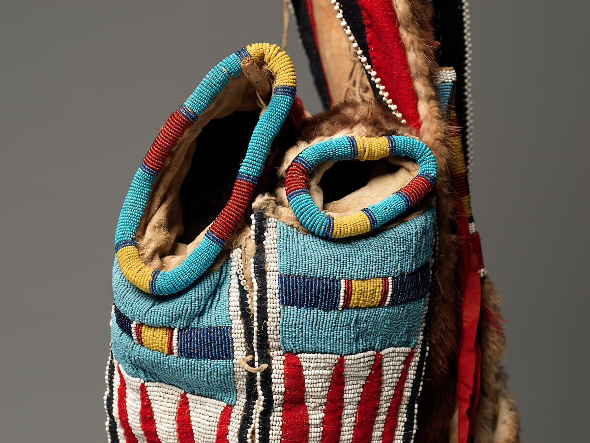 Bowcase and Quiver, Nez Perce artist, Otter skin, native-tanned leather, wool cloth, glass beads, ermine, and silk ribbon, Nez Perce