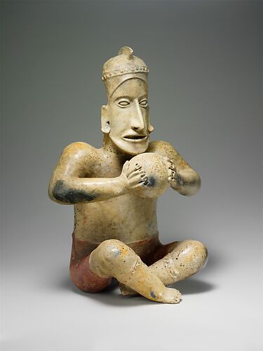 Seated ballplayer