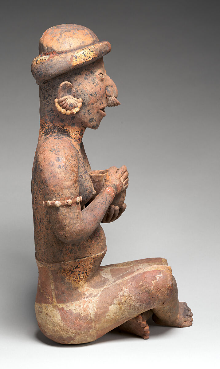 Seated female figure, Nayarit artist(s), Ceramic, slip, Nayarit