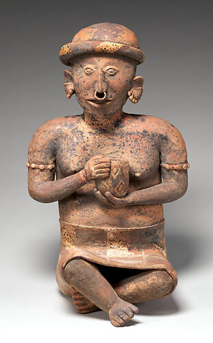 Seated female figure