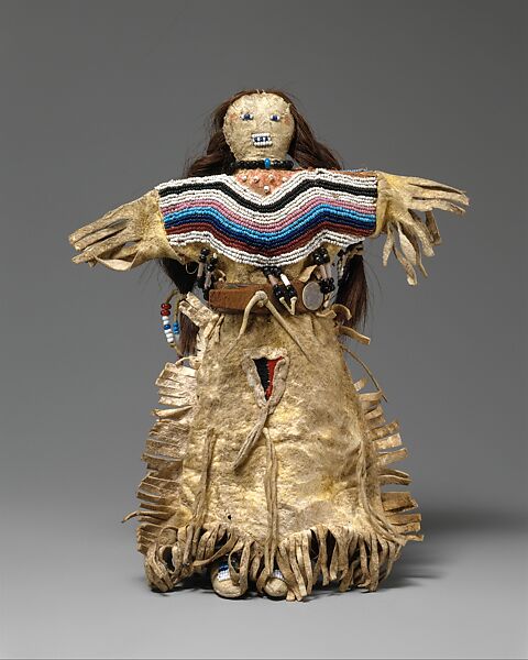Doll, Native-tanned skin, hair, glass, wool, leather, metal, Blackfeet 