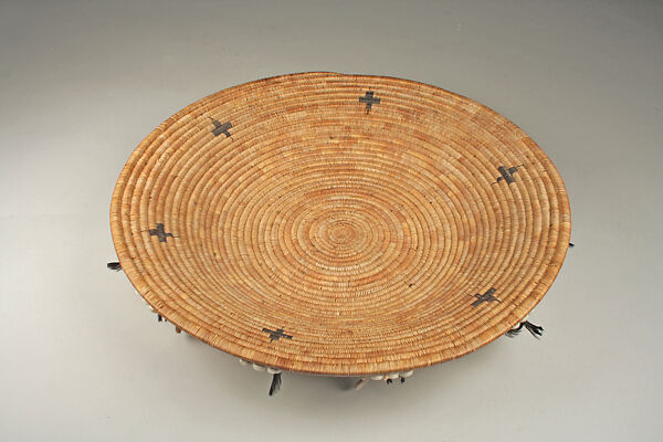 Fully feathered three-rod coiled plate-form basket, Pomo artist (Lake County, California), Willow shoot foundation, sedge root weft, feathers (red-winged blackbird, western meadowlark, mallard, California valley quail topknots), clamshell disk beads, abalone pendants, and cotton string, Pomo (Lake County, California)