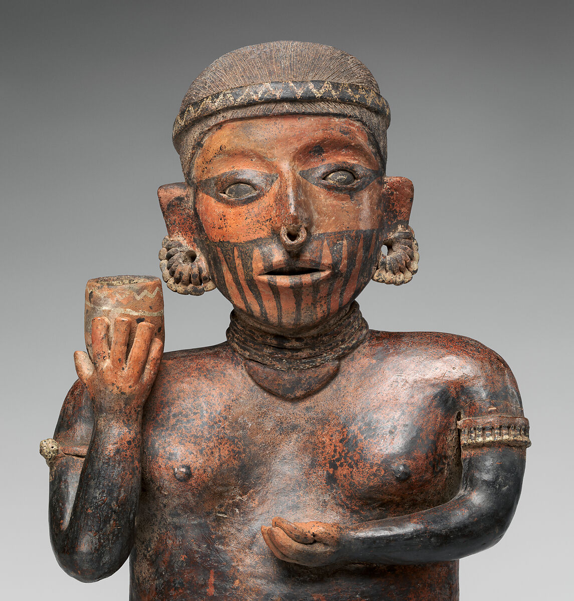 Standing female figure, Nayarit artist(s), Ceramic, slip, Nayarit