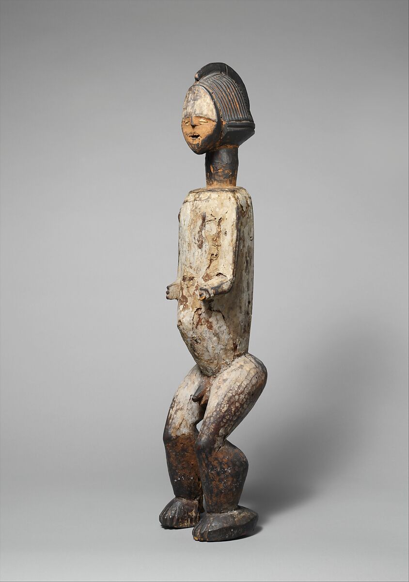 Reliquary figure, Mbete-Kota artist, Wood, pigment, metal, cowrie shells, Kota peoples, Mbete group