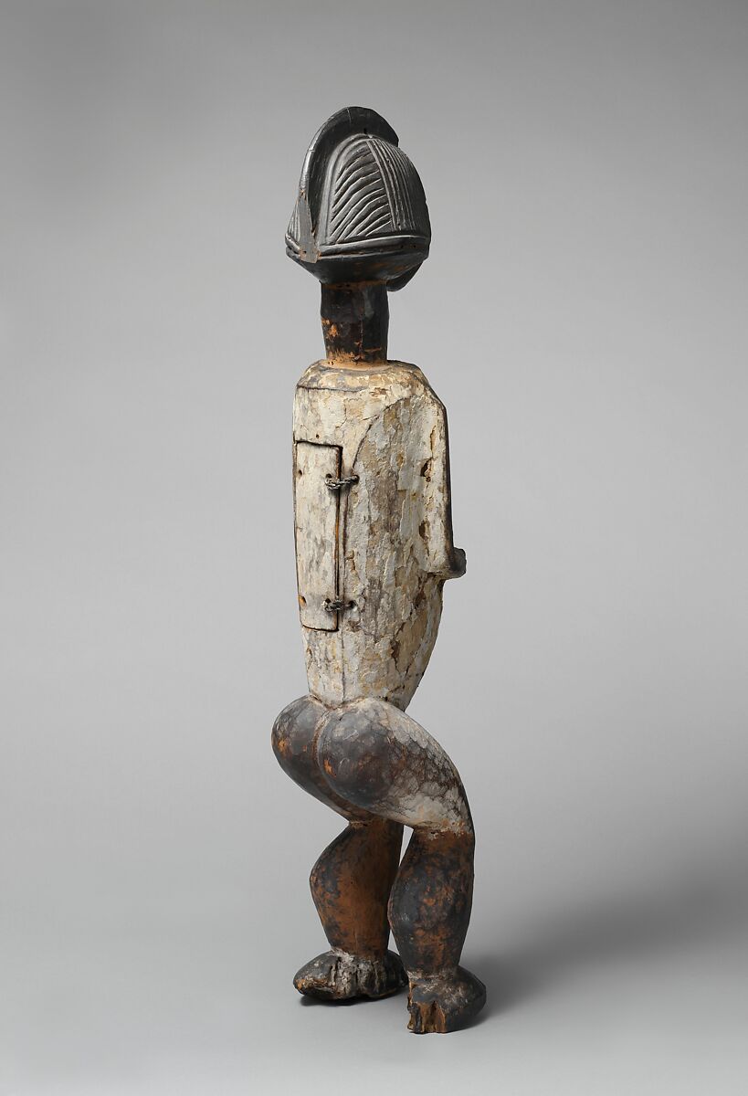 Reliquary figure, Mbete-Kota artist, Wood, pigment, metal, cowrie shells, Kota peoples, Mbete group