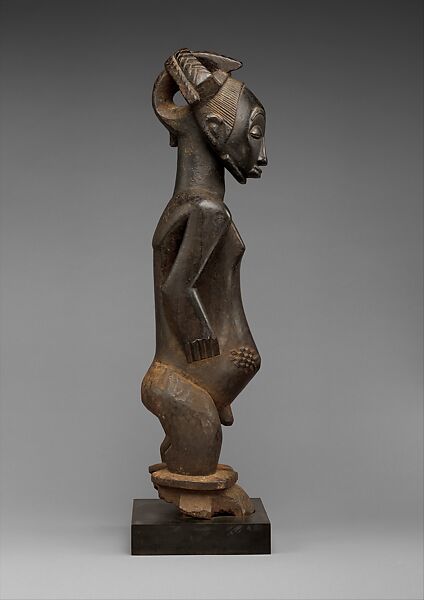 Singiti (commemorative portrait of a chief), Hemba artist, Wood, pigment, Hemba