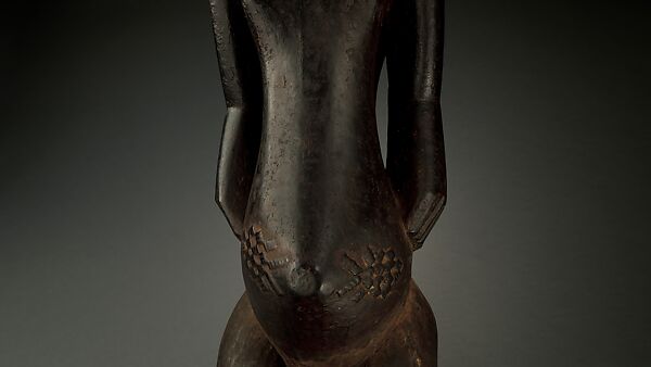 Singiti (commemorative portrait of a chief), Hemba artist, Wood, pigment, Hemba