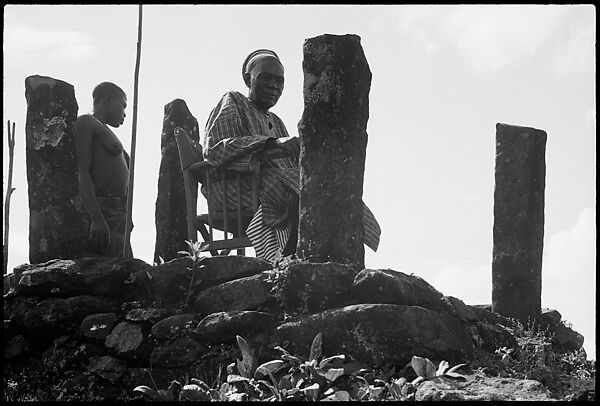 Fon Ndi (r. 1926–54) at the sacred basalt stone platform overlooking the Kom hills, Paul Gebauer (American (born Germany), 1900–1977), Epson print from 35mm black-and-white negative 