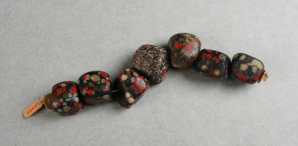Beads, string of seven