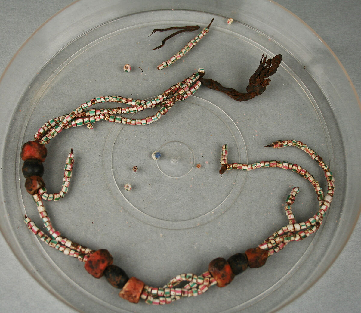 Necklace, Glass, uncertain possibly glass material, carnelian?, string, African, made in Europe 