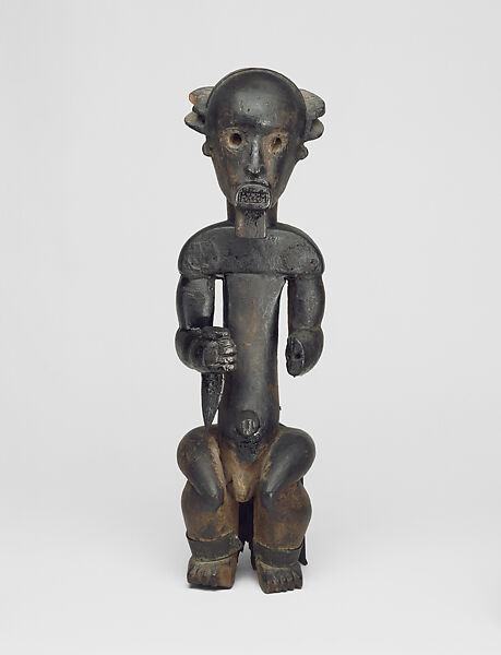 Figure from a Reliquary Ensemble: Seated Male Holding Horn, Wood, metal strips, Fang peoples, Ngumba group 