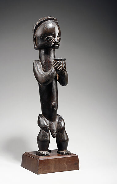 Figure from a Reliquary Ensemble: Seated Male Holding Vessel, Wood, brass or copper, Fang peoples 