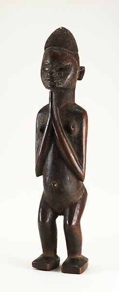 Figure: Female, Wood with glass, white pigment, and animal claw, Beembe peoples 