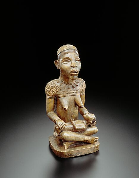 Figure: Seated Female Supporting Figure with Clasped Hands, Master of Kasadi, Wood (Nauclea latifolia Smith), glass, kaolin, Kongo peoples; Yombe group 