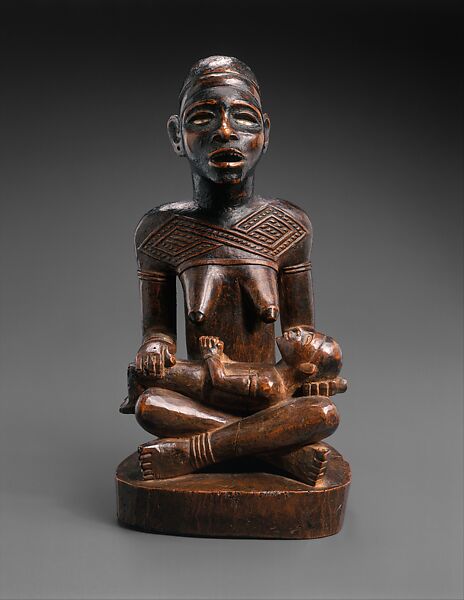 Figure: Seated Female Supporting Figure with Clasped Hands, Master of Kasadi, Wood, metal, kaolin, Kongo peoples, Yombe group 