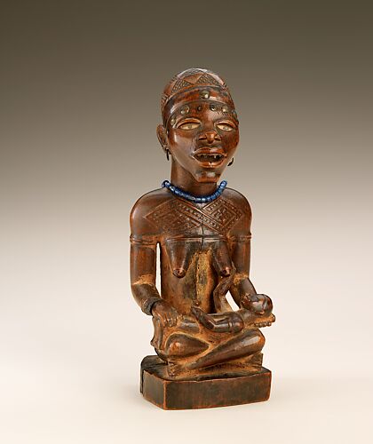 Figure: Seated Female with Child