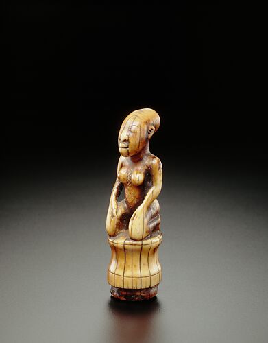 Staff Finial: Kneeling Female Figure