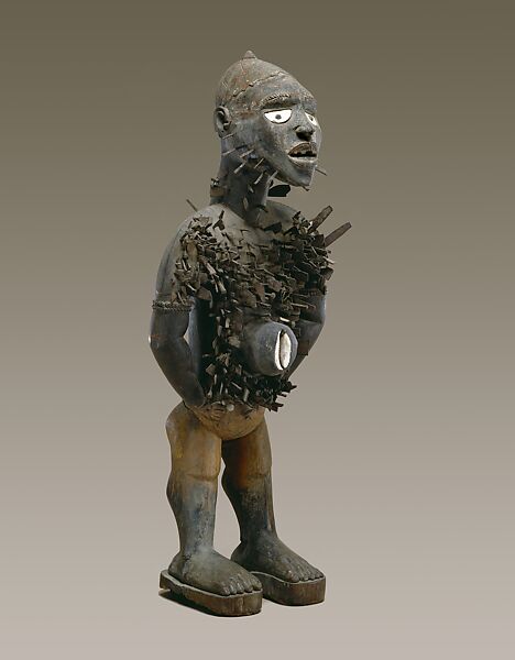 Power Figure (Nkisi N'Kondi: Mangaaka), Wood (Canarium schweinfurthii Engl.), iron, resin, cowrie shell, ceramic, plant fiber, textile, pigment, Kongo peoples; Yombe group