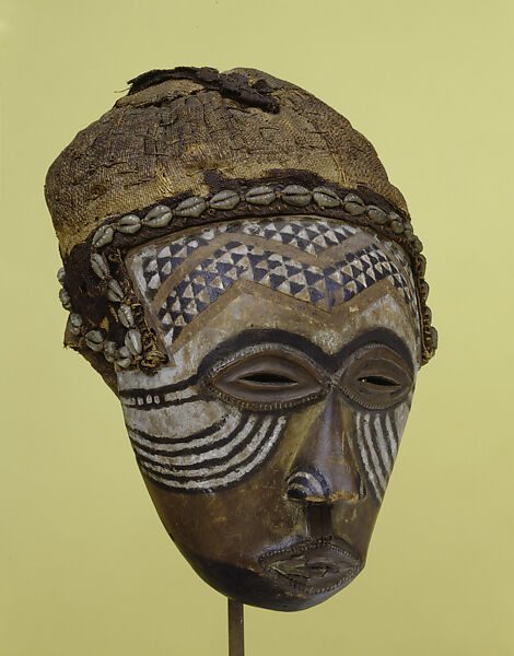 Female Face Mask (ngady mwaash), Wood, pigment, raffia textile, cowrie shell, Kuba peoples 