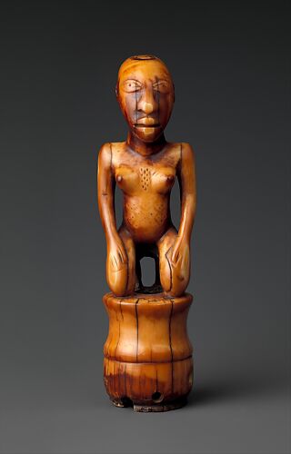 Staff Finial: Kneeling Female Figure
