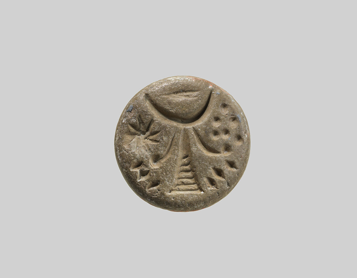 Stamp seal (button-shaped) with divine symbols, Glazed ceramic, Assyrian