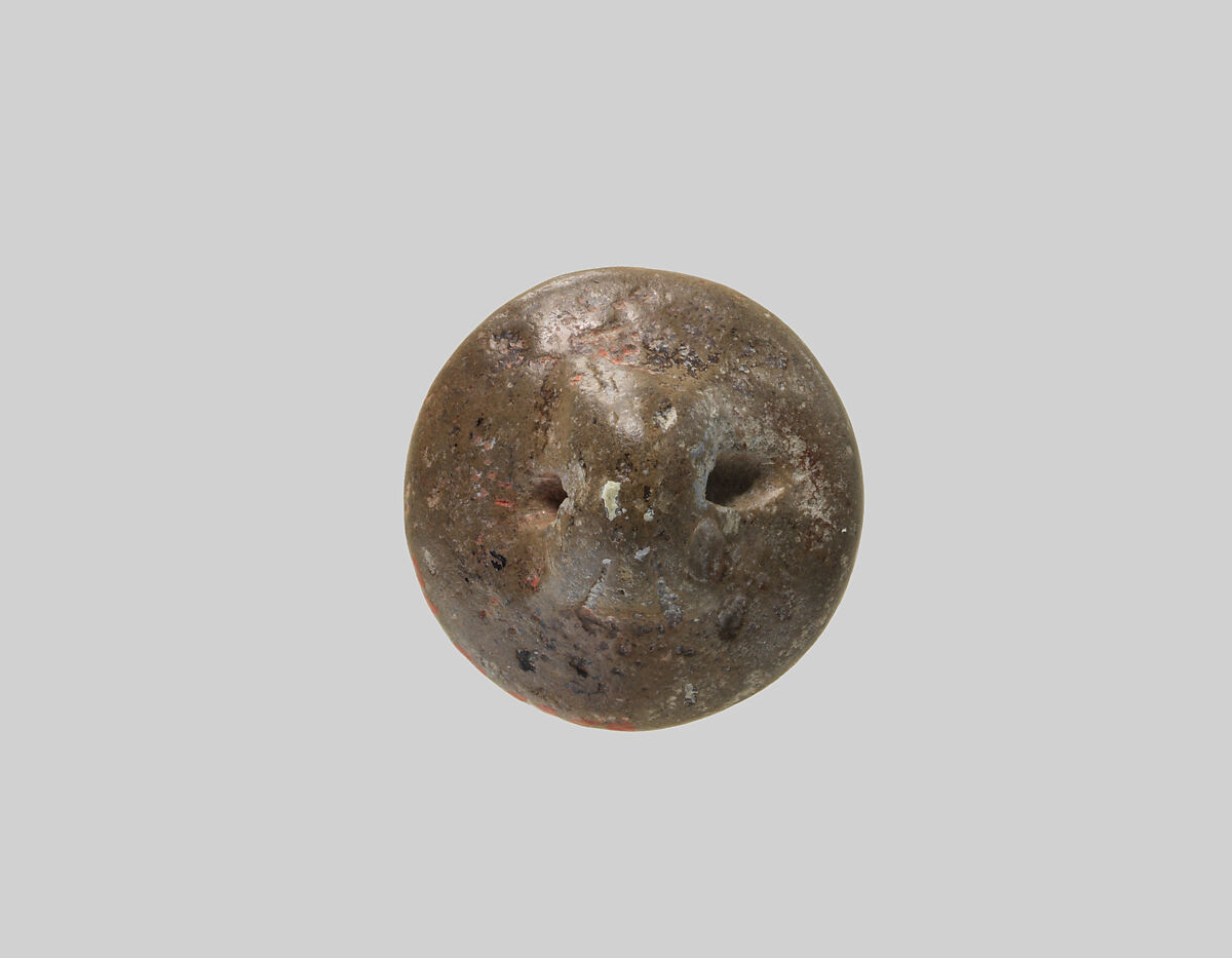 Stamp seal (button-shaped) with divine symbols, Glazed ceramic, Assyrian