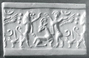 Cylinder seal and modern impression: lion and sphinx over an antelope, Black-grey steatite, Cypriot 