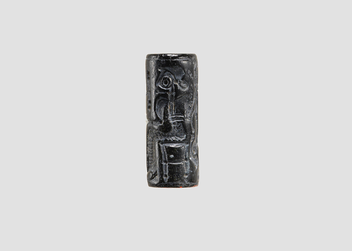 Cylinder seal and modern impression: seated figure holding the tail of a griffin, Black steatite, Cypriot