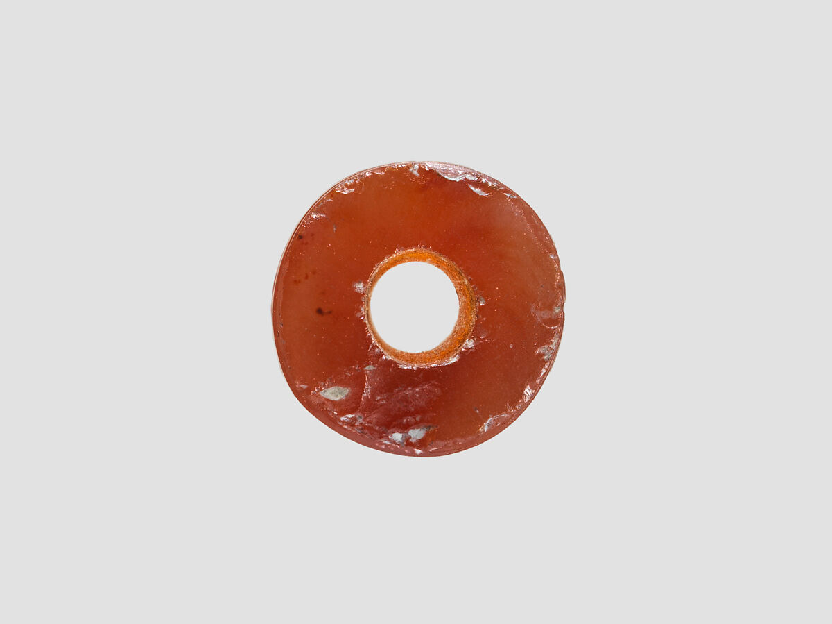 Cylinder seal and modern impression: man, goat, griffin, nude figure, and "impaled triangle", Carnelian