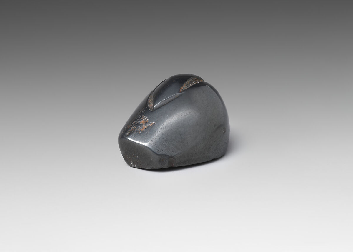 Weight in the shape of a duck, Hematite