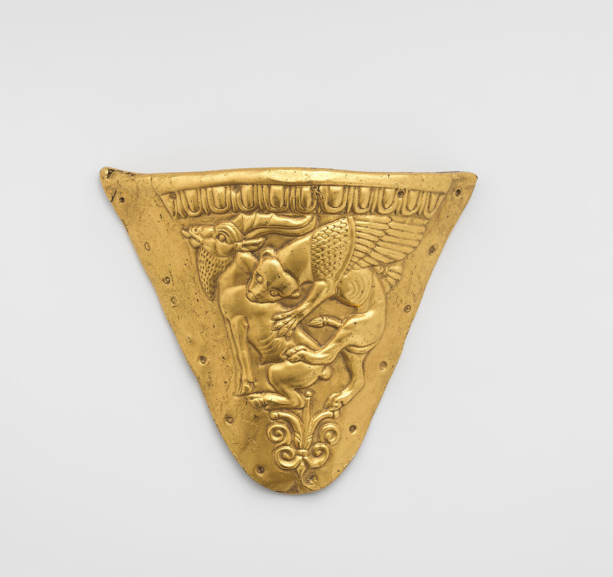 Reproduction of a Scythian plaque with animal combat