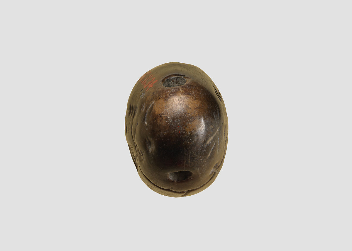 Stamp seal (oval conoid) with cultic scene, deity, and divine symbols, Dark brown limestone, Assyrian