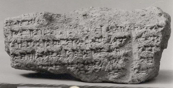 Cuneiform cylinder: inscription of Nebuchadnezzar II describing work done on a wall and moat